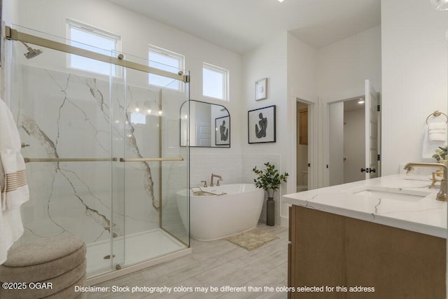 1713 E White Oak St, Joplin, MO 64801 - full bathroom with a marble finish shower, a freestanding tub, and double vanity