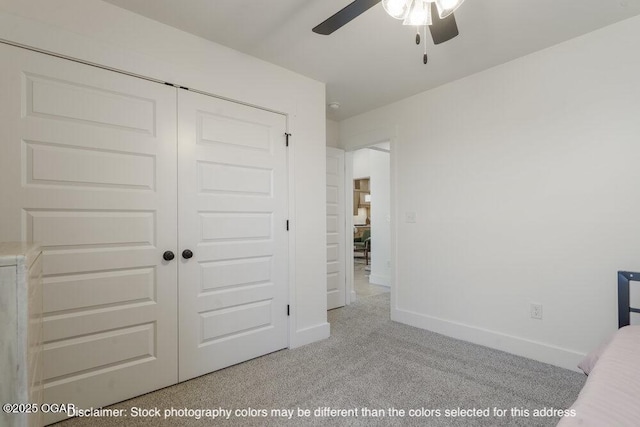 1713 E White Oak St, Joplin, MO 64801 - unfurnished bedroom featuring carpet floors, baseboards, and a closet