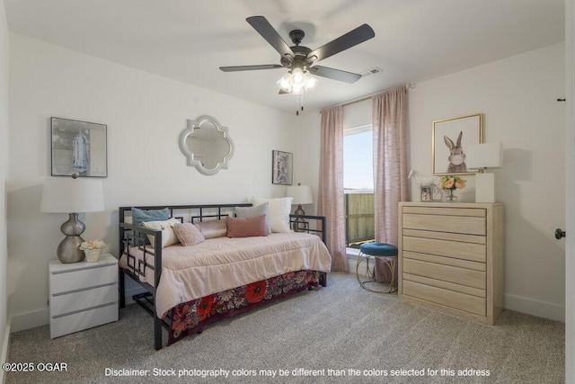 1713 E White Oak St, Joplin, MO 64801 - bedroom featuring carpet floors, ceiling fan, and baseboards