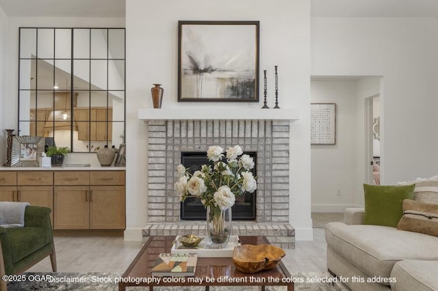1713 E White Oak St, Joplin, MO 64801 - living area with a brick fireplace and baseboards