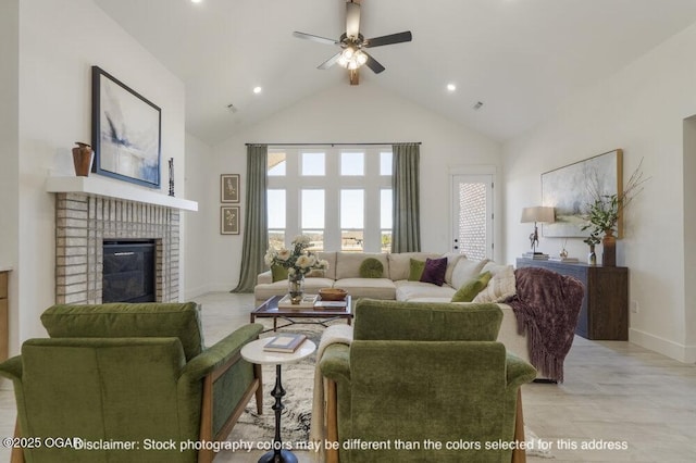 1713 E White Oak St, Joplin, MO 64801 - living area with ceiling fan, high vaulted ceiling, baseboards, a fireplace, and recessed lighting