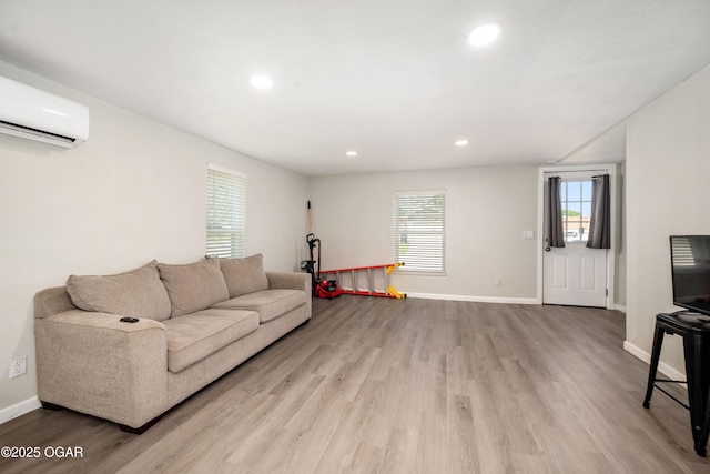 201 S Tom, Webb City, MO 64870 - living room with a wall mounted air conditioner, wood finished floors, recessed lighting, and baseboards