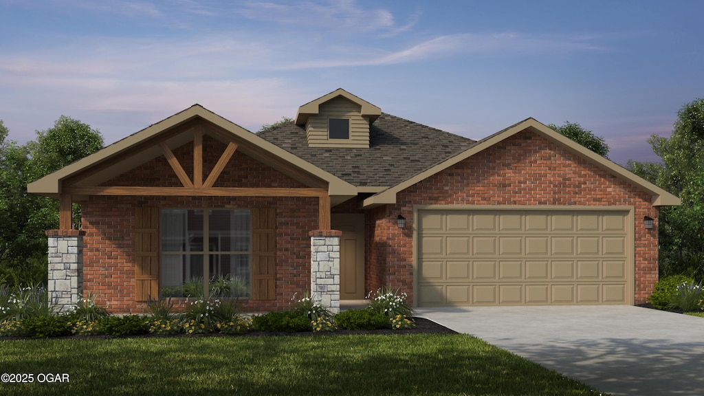 3607 N Mckee Ave, Joplin, MO 64801 - view of front of home featuring brick siding, concrete driveway, a garage, and a front yard