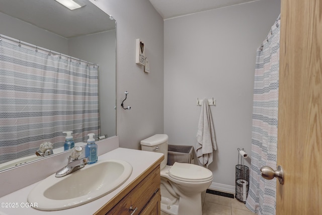 505 W Gault St, Carl Junction, MO 64834 - bathroom with toilet, vanity, and tile patterned floors