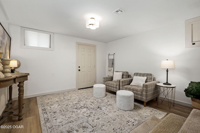 2716 E 14th St, Joplin, MO 64801 - living room with baseboards and wood finished floors