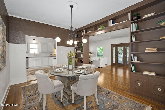 2716 E 14th St, Joplin, MO 64801 - dining room with wood finished floors and baseboards
