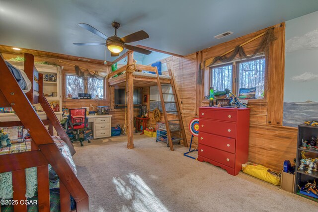 4 Emerald Dr, Joplin, MO 64804 - bedroom featuring multiple windows, carpet flooring, and wood walls