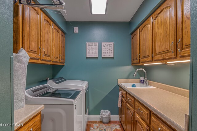 4 Emerald Dr, Joplin, MO 64804 - laundry area featuring cabinet space, separate washer and dryer, tile patterned flooring, and baseboards