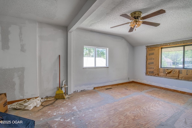 219 N Moffet Ave, Joplin, MO 64801 - empty room featuring a textured ceiling, a ceiling fan, and lofted ceiling