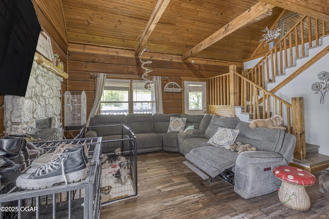 3219 Hughes Ave, Parsons, KS 67357 - living room featuring wood finished floors, stairs, wood ceiling with exposed beams, wood walls, and high vaulted ceiling