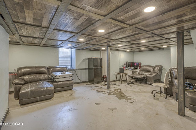 3219 Hughes Ave, Parsons, KS 67357 - below grade area featuring freestanding refrigerator