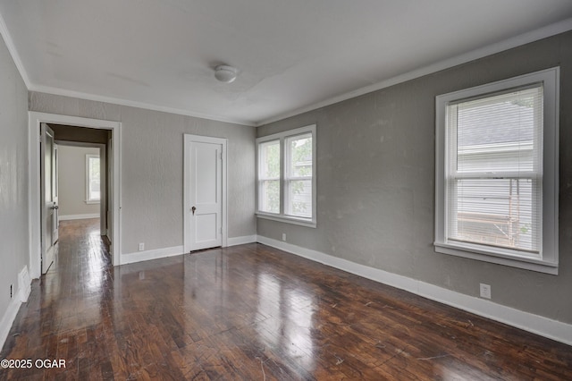 602 S Highland Ave, Joplin, MO 64801 - unfurnished bedroom with crown molding, wood-type flooring, and baseboards