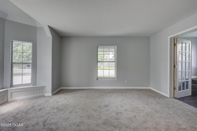 109 N Main St, Alba, MO 64830 - carpeted empty room with baseboards