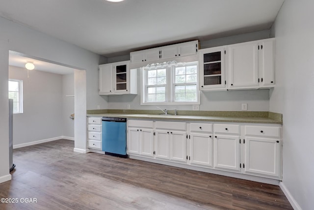 109 N Main St, Alba, MO 64830 - kitchen with dishwasher, white cabinets, dark wood-style floors, and plenty of natural light