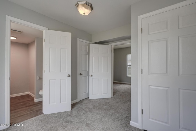 109 N Main St, Alba, MO 64830 - unfurnished bedroom with carpet and baseboards