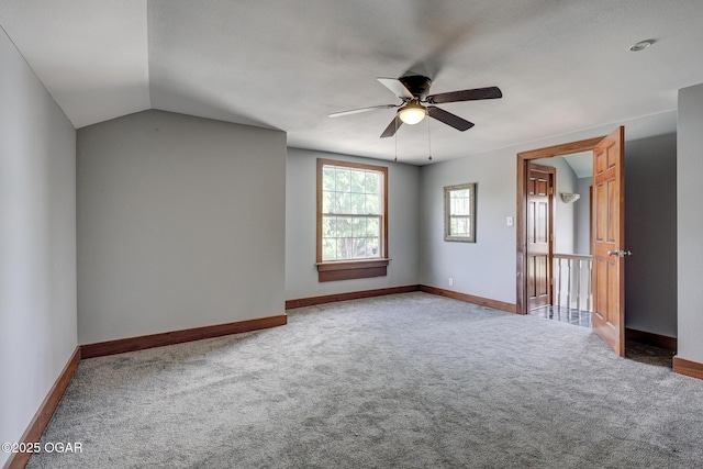 109 N Main St, Alba, MO 64830 - unfurnished bedroom with carpet flooring, baseboards, ceiling fan, and lofted ceiling