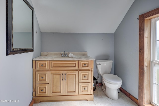 109 N Main St, Alba, MO 64830 - bathroom featuring toilet, baseboards, vanity, and tile patterned flooring