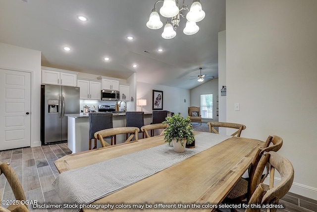 1619 Sedge St, Joplin, MO 64801 - dining room featuring vaulted ceiling, wood finish floors, a chandelier, recessed lighting, and a ceiling fan