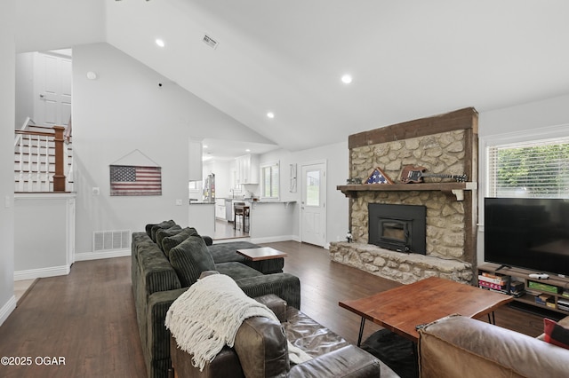 5594 Riverside Dr, Joplin, MO 64804 - living area featuring stairway, wood finished floors, baseboards, recessed lighting, and high vaulted ceiling
