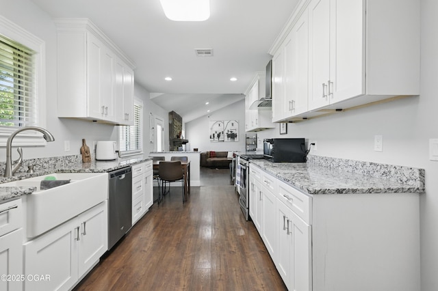 5594 Riverside Dr, Joplin, MO 64804 - kitchen featuring stainless steel appliances, a sink, healthy amount of natural light, white cabinets, and recessed lighting