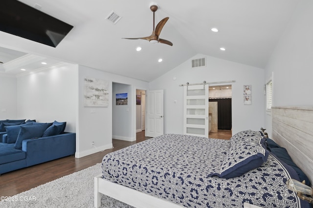 5594 Riverside Dr, Joplin, MO 64804 - bedroom featuring a barn door, wood finished floors, recessed lighting, vaulted ceiling, and a ceiling fan