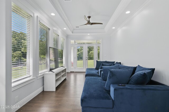5594 Riverside Dr, Joplin, MO 64804 - living room with plenty of natural light, ornamental molding, french doors, a ceiling fan, and dark wood-type flooring