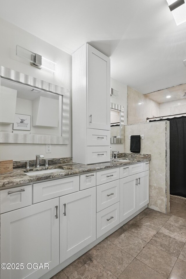 5594 Riverside Dr, Joplin, MO 64804 - full bath featuring double vanity and a shower
