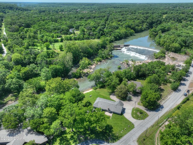 5594 Riverside Dr, Joplin, MO 64804 - aerial overview of property's location with a forest and a nearby body of water