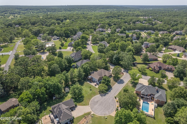 2402 Melissa Ln, Joplin, MO 64804 - aerial perspective of suburban area featuring a forest