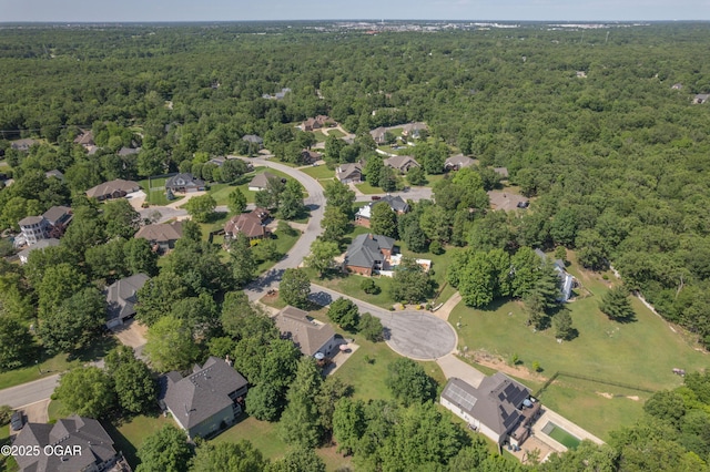 2402 Melissa Ln, Joplin, MO 64804 - aerial view of property and surrounding area with a heavily wooded area and nearby suburban area