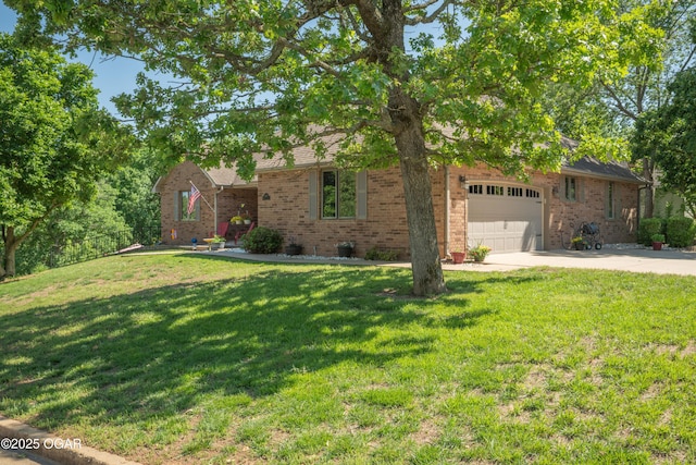 2402 Melissa Ln, Joplin, MO 64804 - view of front of home featuring concrete driveway, an attached garage, a front yard, and brick siding