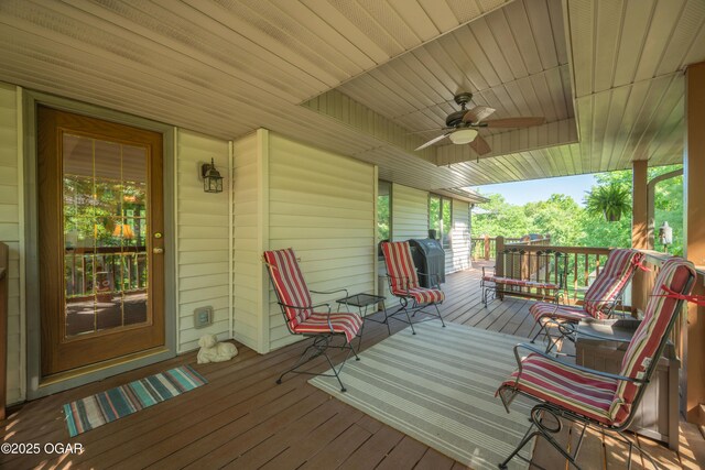 2402 Melissa Ln, Joplin, MO 64804 - wooden porch with a ceiling fan