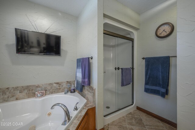 2402 Melissa Ln, Joplin, MO 64804 - full bath featuring a tub with jets and a shower stall