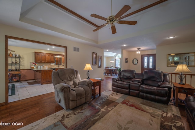 2402 Melissa Ln, Joplin, MO 64804 - living room featuring light wood-style flooring, a ceiling fan, and recessed lighting