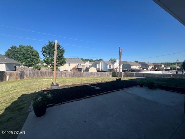 305 Ashmore Dr, Carl Junction, MO 64834 - view of patio / terrace featuring a residential view