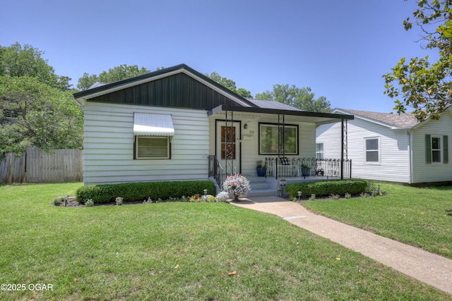 430 N Jackson Ave, Joplin, MO 64801 - bungalow-style house featuring covered porch and board and batten siding