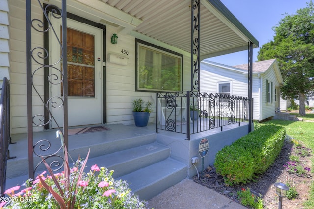 430 N Jackson Ave, Joplin, MO 64801 - doorway to property with a porch