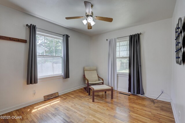 430 N Jackson Ave, Joplin, MO 64801 - sitting room with hardwood / wood-style floors, a ceiling fan, and baseboards