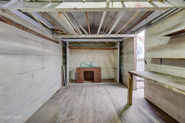 430 N Jackson Ave, Joplin, MO 64801 - below grade area with wood finished floors