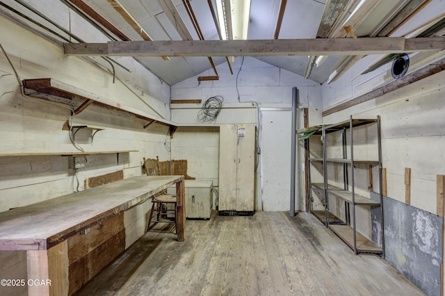 430 N Jackson Ave, Joplin, MO 64801 - basement with wood finished floors and a workshop area