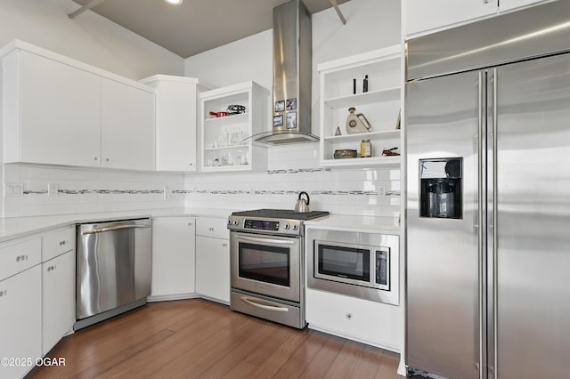 214 E 4th St Unit 402, Joplin, MO 64801 - kitchen featuring built in appliances, island range hood, open shelves, light countertops, and decorative backsplash