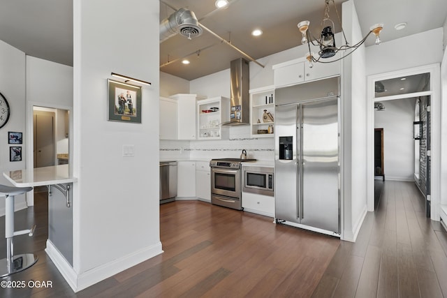 214 E 4th St Unit 402, Joplin, MO 64801 - kitchen featuring built in appliances, range hood, open shelves, white cabinets, and light countertops