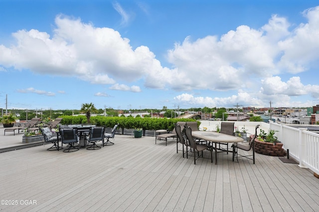 214 E 4th St Unit 402, Joplin, MO 64801 - wooden terrace featuring outdoor dining space