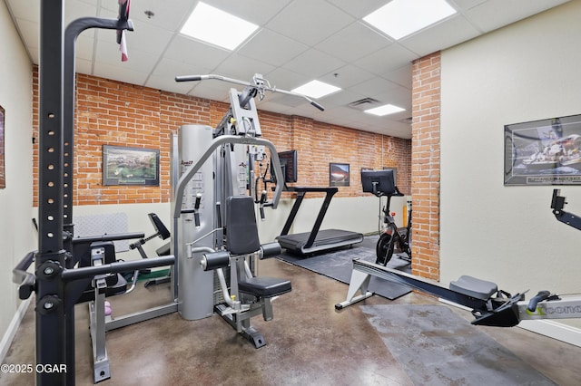 214 E 4th St Unit 402, Joplin, MO 64801 - gym with a paneled ceiling and baseboards