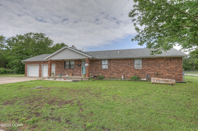 610 N Madison St, Webb City, MO 64870 - ranch-style house featuring brick siding, an attached garage, driveway, and a shingled roof