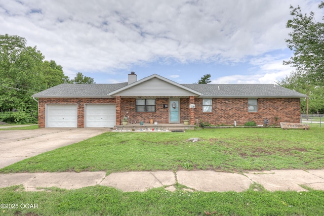 610 N Madison St, Webb City, MO 64870 - view of front of house featuring brick siding, a garage, a chimney, driveway, and a shingled roof