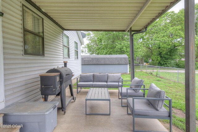 610 N Madison St, Webb City, MO 64870 - view of patio with an outdoor living space and area for grilling