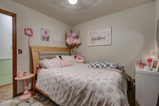 610 N Madison St, Webb City, MO 64870 - bedroom with carpet and a ceiling fan
