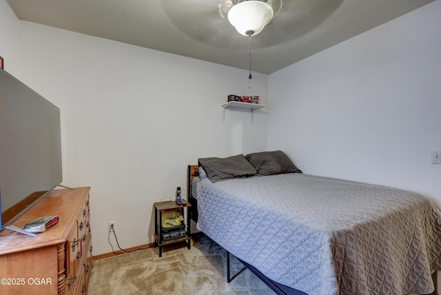 610 N Madison St, Webb City, MO 64870 - carpeted bedroom with baseboards and a ceiling fan