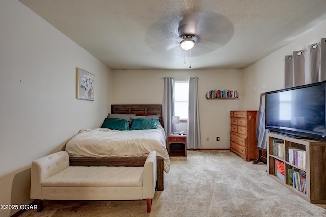 610 N Madison St, Webb City, MO 64870 - bedroom with carpet, ceiling fan, a textured ceiling, and baseboards